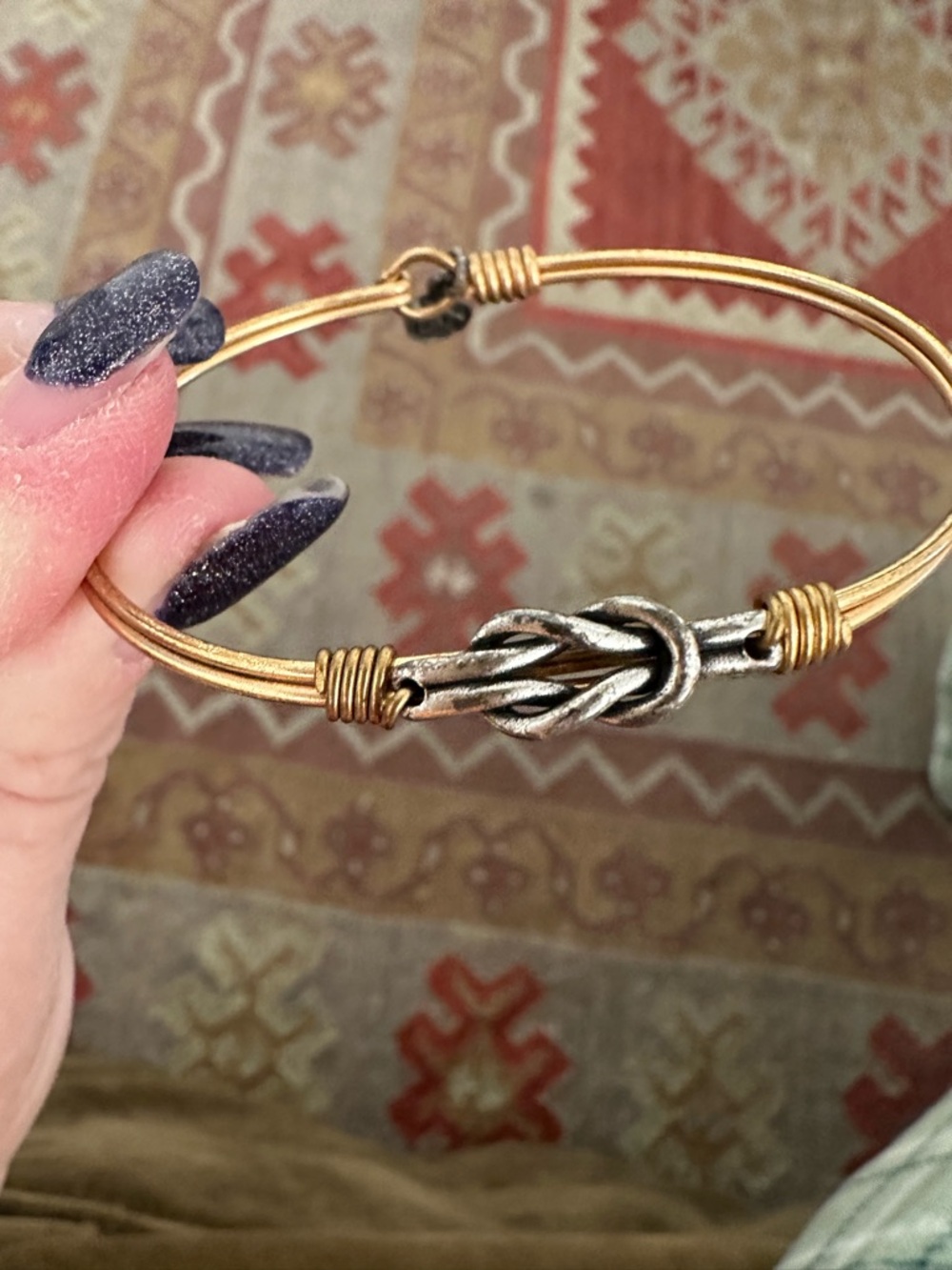 Luca + Danni gold bangle bracelet with silver infinity knot